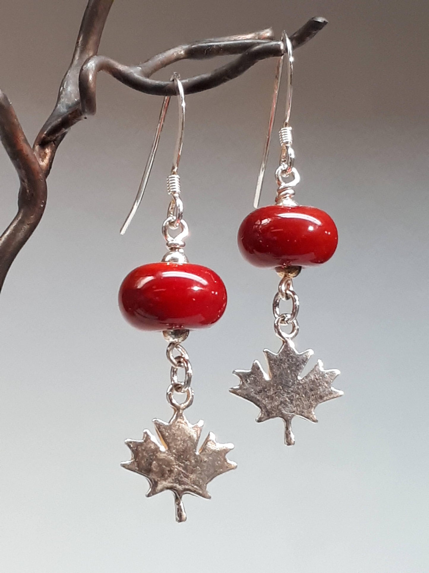Red Glass Beads with Silver Maple Leaf Canadian Made Hanscomb Glass
